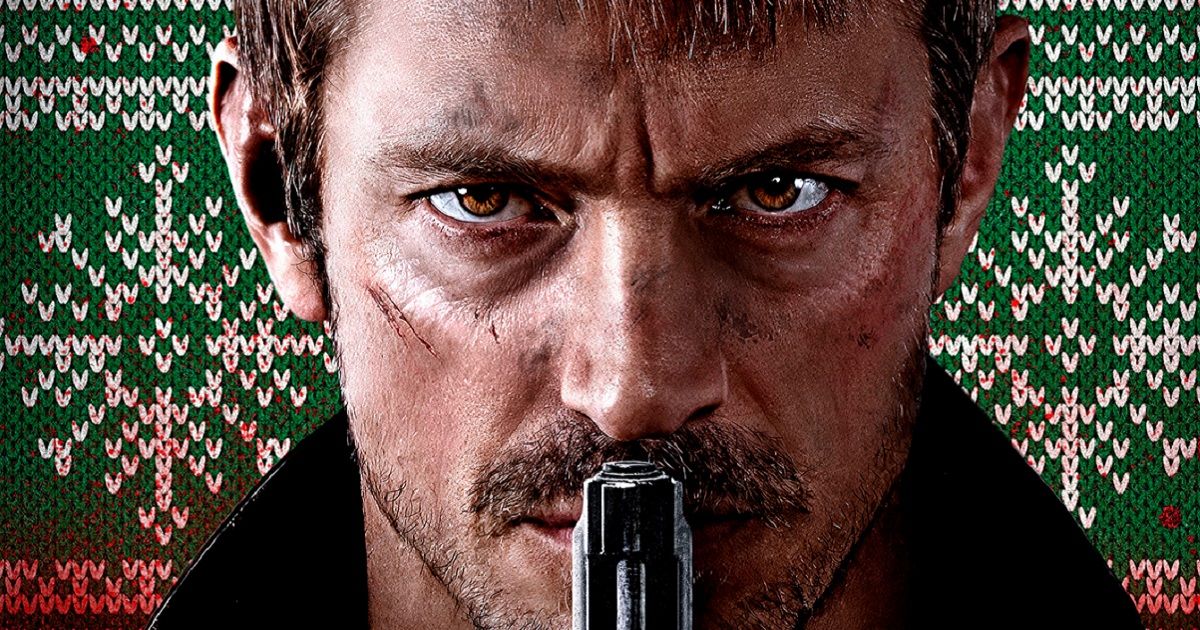 Joel Kinnaman holding a gun to his lips in the Silent Night poster