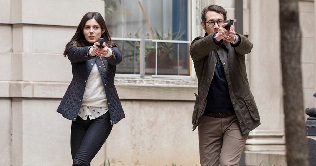 Cora and Tony Jr. aim guns side by side in The Good Cop.