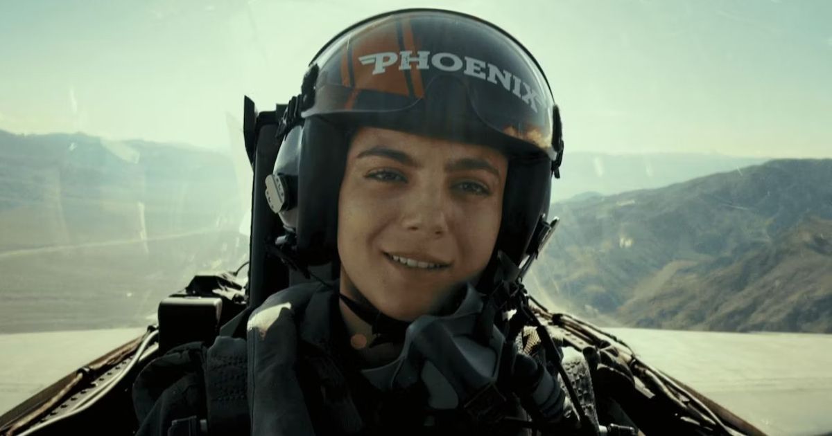 Phoenix smiles in her jet in Top Gun: Maverick.