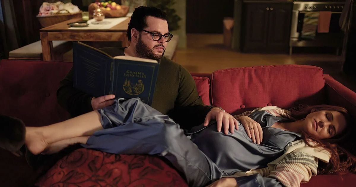 Gary reads a book to Mary in Wolf Like Me.