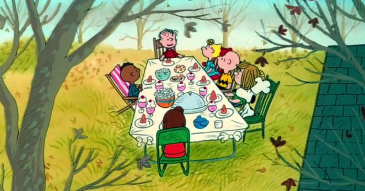 The Peanuts all together at the table in A Charlie Brown Thanksgiving
