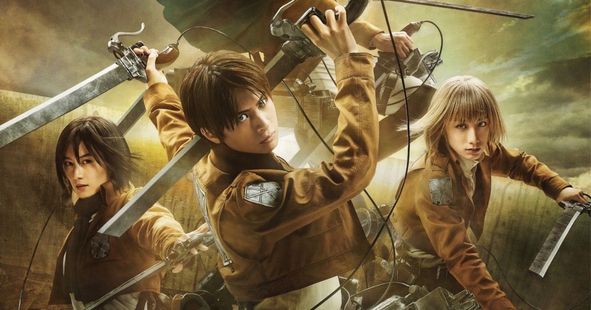 Eren Jaeger, Mikasa Ackerman, and Armin wield ODM gear and blades with their leather jackets in a live-action version of Attack on Titan.