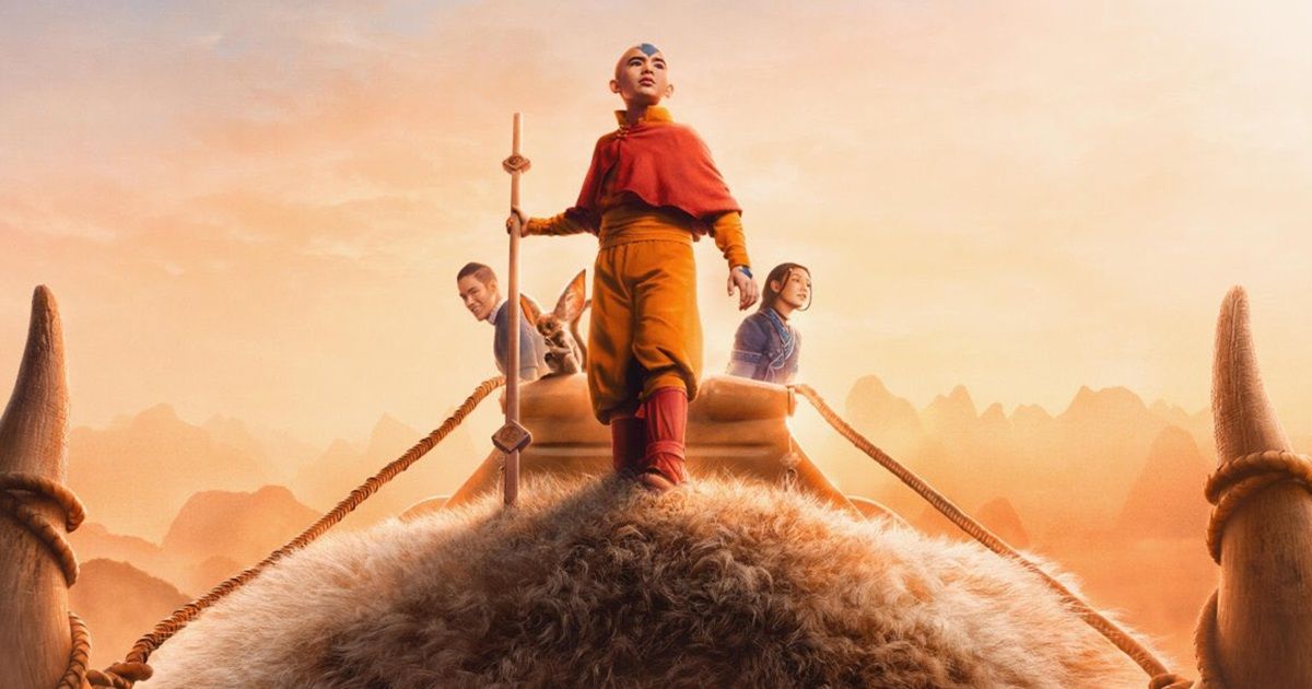 Gordon Cormier as Aang with Kiawentiio as Katara, and Ian Ousley as Sokka riding on top of Appa in Avatar: The Last Airbender