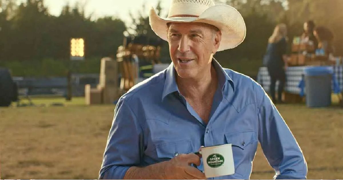 Kevin Costner with a mug of coffee