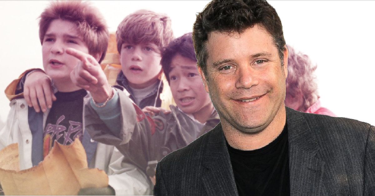 The Goonies star Sean Astin with an image of the young Goonies cast