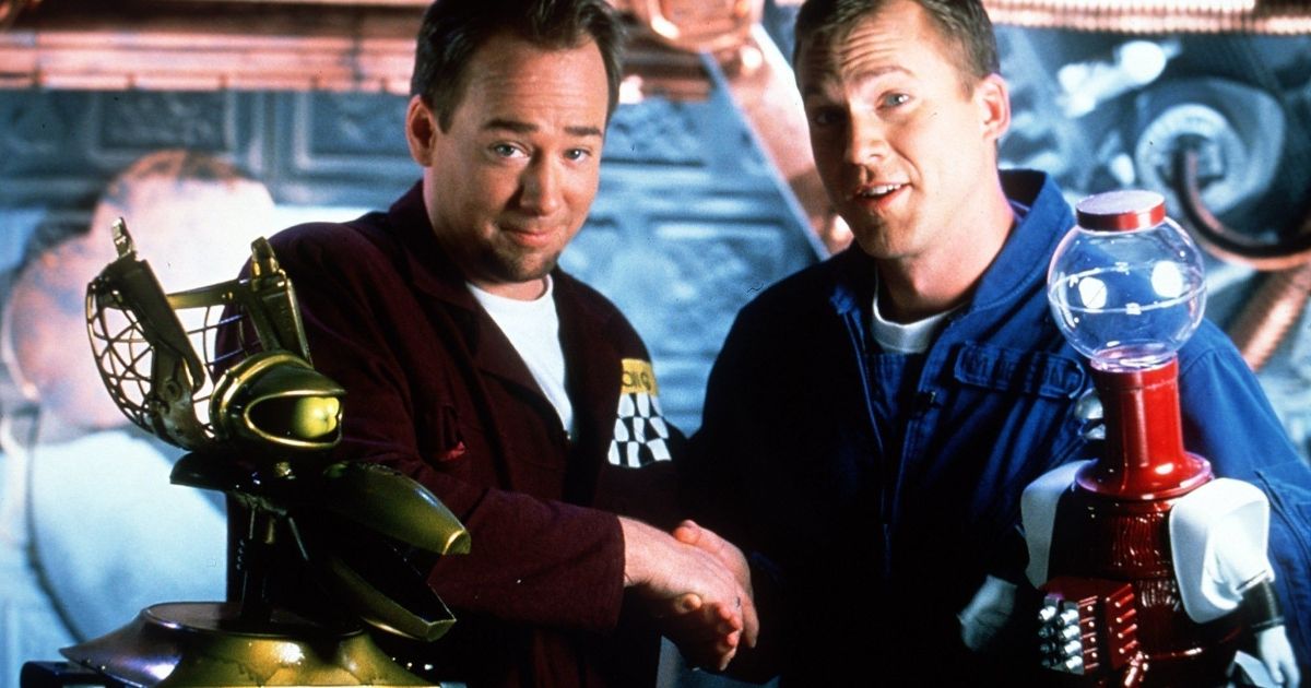 Mystery Science Theater 3000 hosts Joel Hodgson and Mike Nelson with the robots Crow and Tom Servo