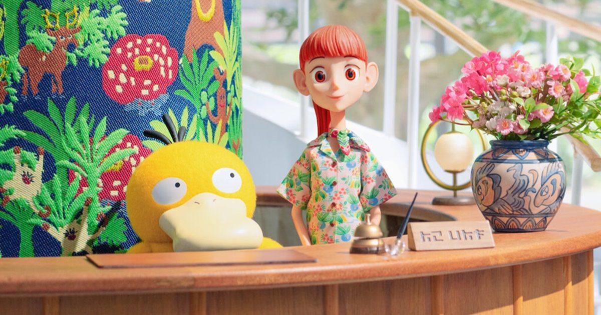 Haru and Psyduck at the front desk of a resort, waiting for guests in Pokemon Concierge