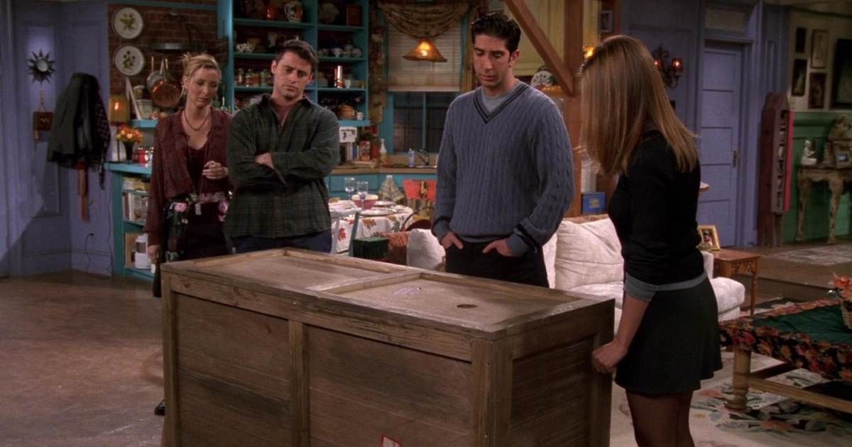 ross rachel phoebe and joey look at a box in friends episode the one with chandler in a box