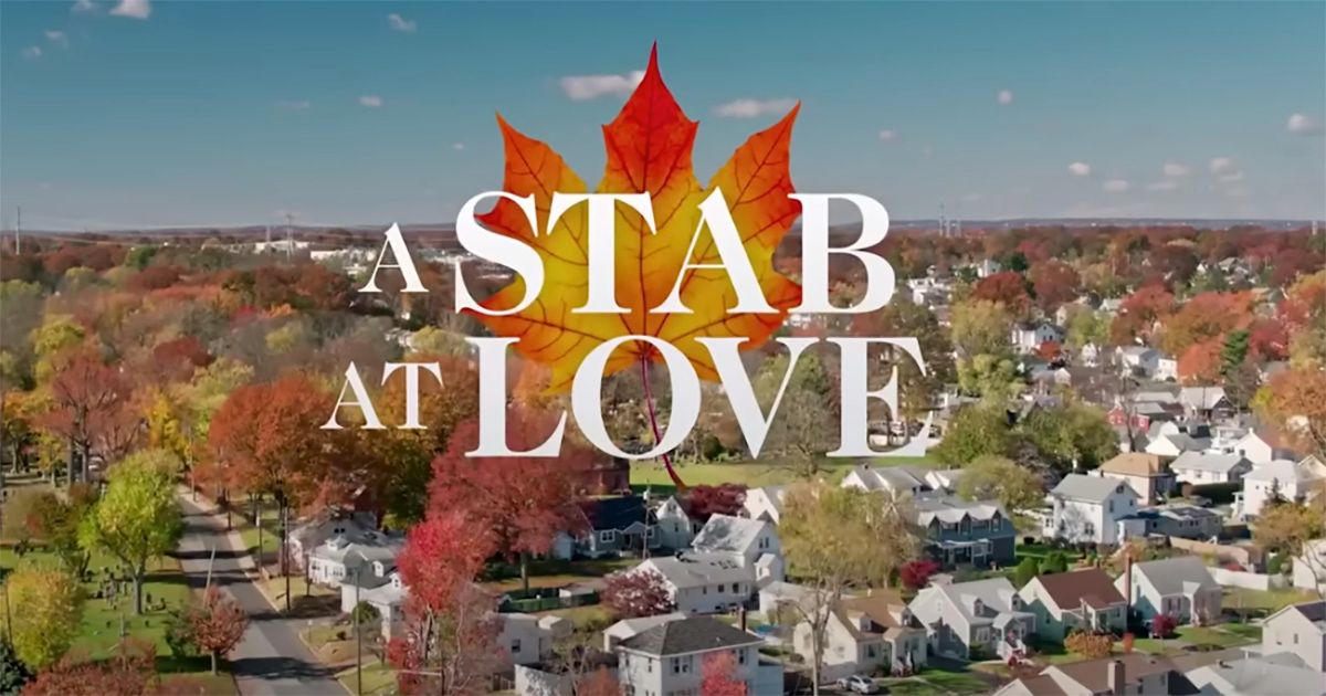 The fictional title card for A Stab At Love, featuring a suburban town in the background meant to mimic a hallmark horror movie for an SNL skit.