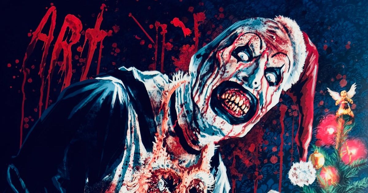 A poster for Terrifier 3, with Art the Clown covered in blood near a Christmas tree, and his name written in blood on the wall.
