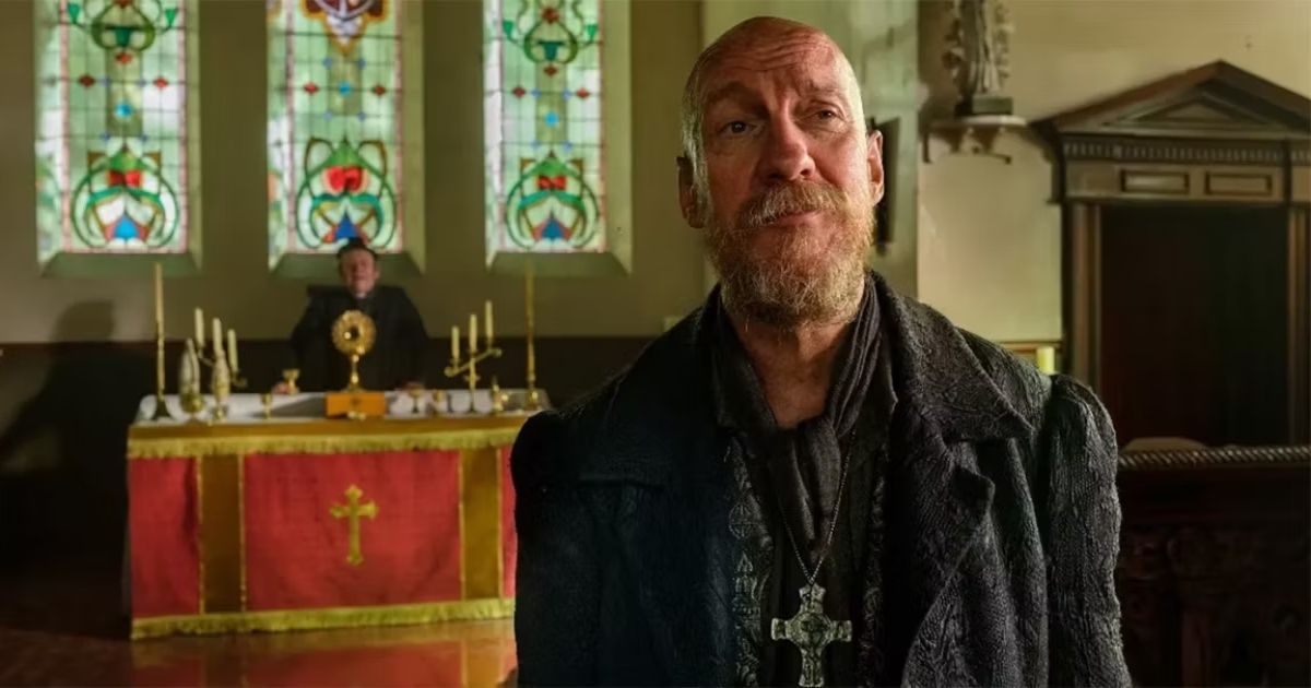 The Artful Dodger star David Thewlis stands in a church