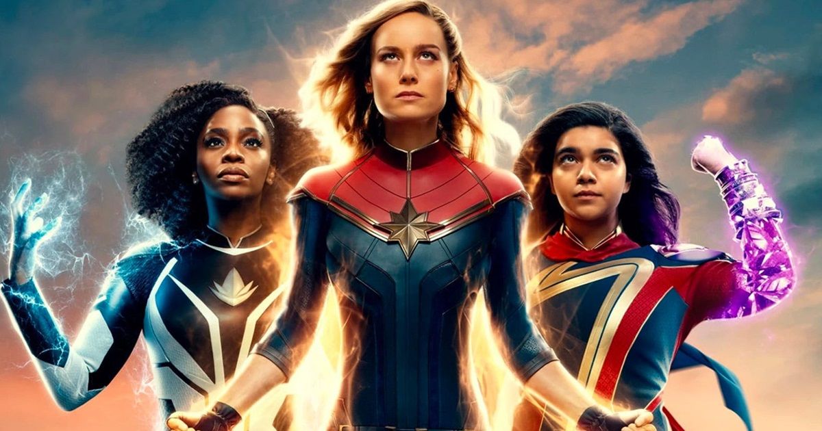 The main cast of The Marvels including Brie Larson as Captain Marvel, Teyonah Parris as Marie Rambeau, and Iman Vellani as Ms Marvel, all with their supersuits on, using their powers in a poster.