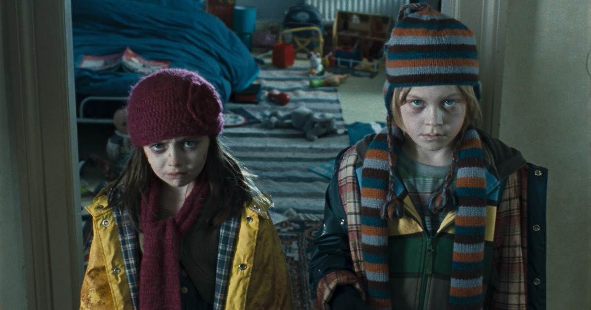 two creepy-looking kids in film the children