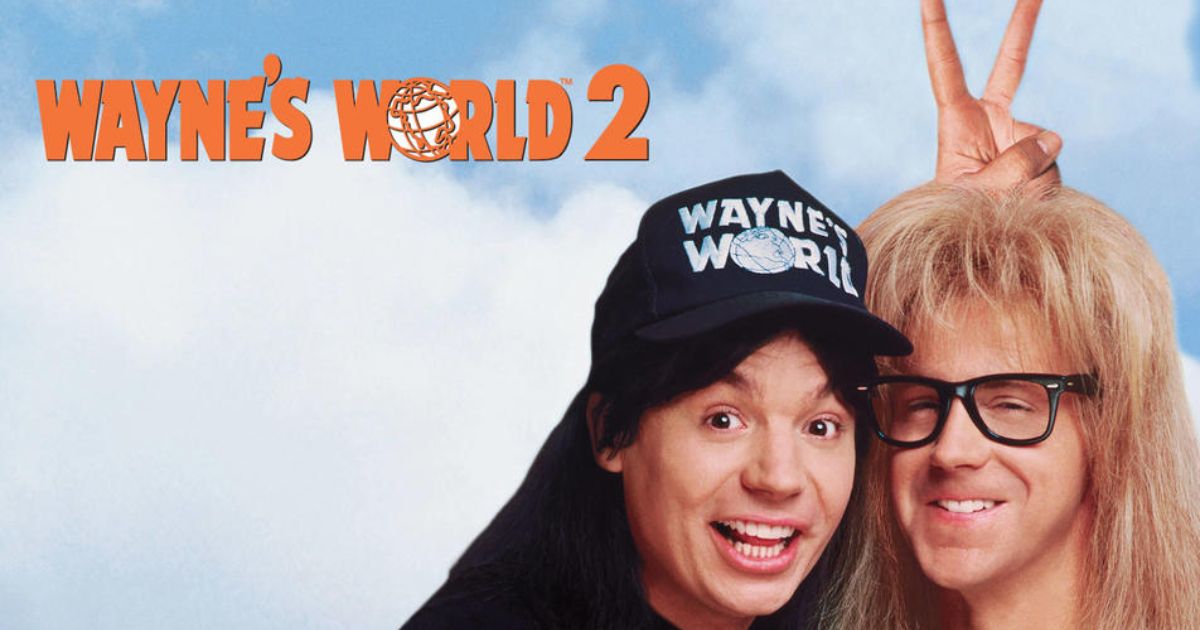 Mike Myers as Wayne Campbell and Dana Carvey as Garth Algar, with Myers putting up a bunny ears sign behind Carvey's head in a poster for Wayne's World 2.