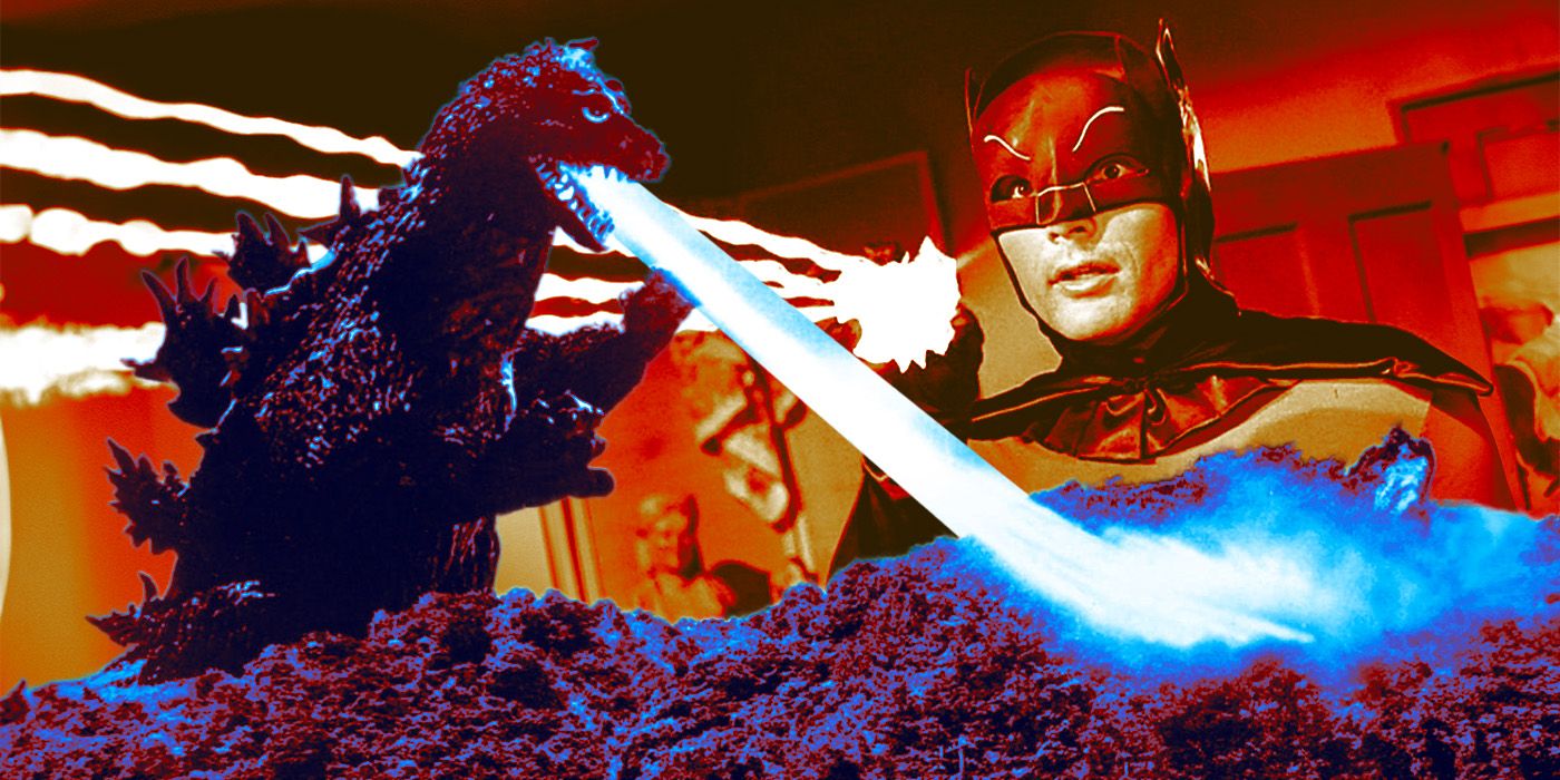 Adam West as Batman using a device that shoots beams at Godzilla as he terrorizes Japan
