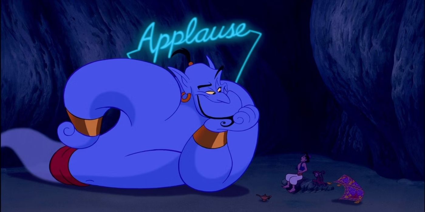 Aladdin the genie with the applause sign next to aladdin, abu, and the flying carpet in the cave of wonders