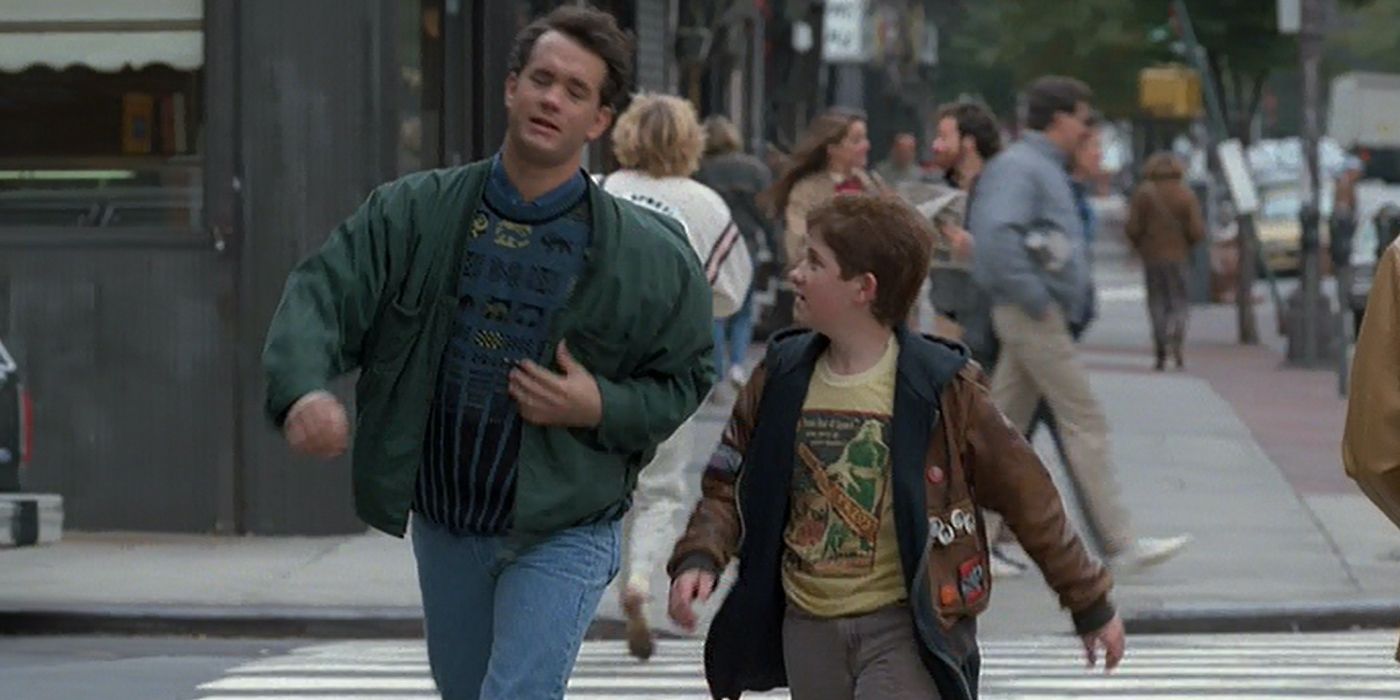 Big Tom Hanks as Josh Baskin and Jared Rushton as Billy walking down the street