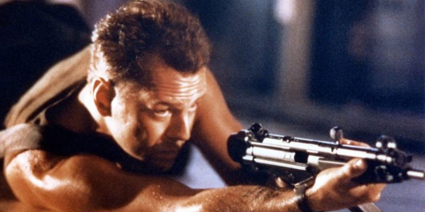 Bruce Willis lying down on the ground in Die Hard