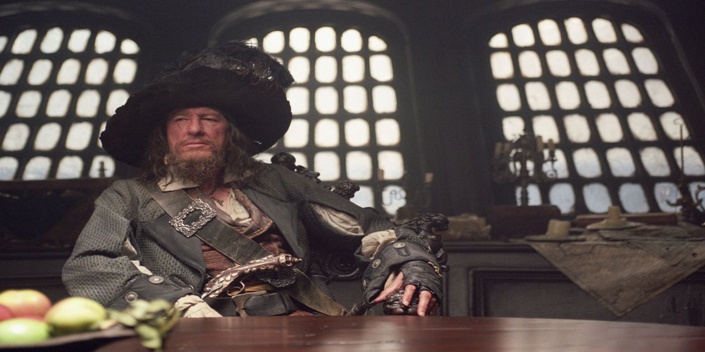 Captain Hector Barbossa sitting at chair in Pirates of the Caribbean 
