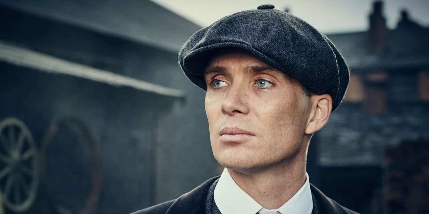 Cillian Murphy in Peaky Blinders as Tommy Shelby standing outside