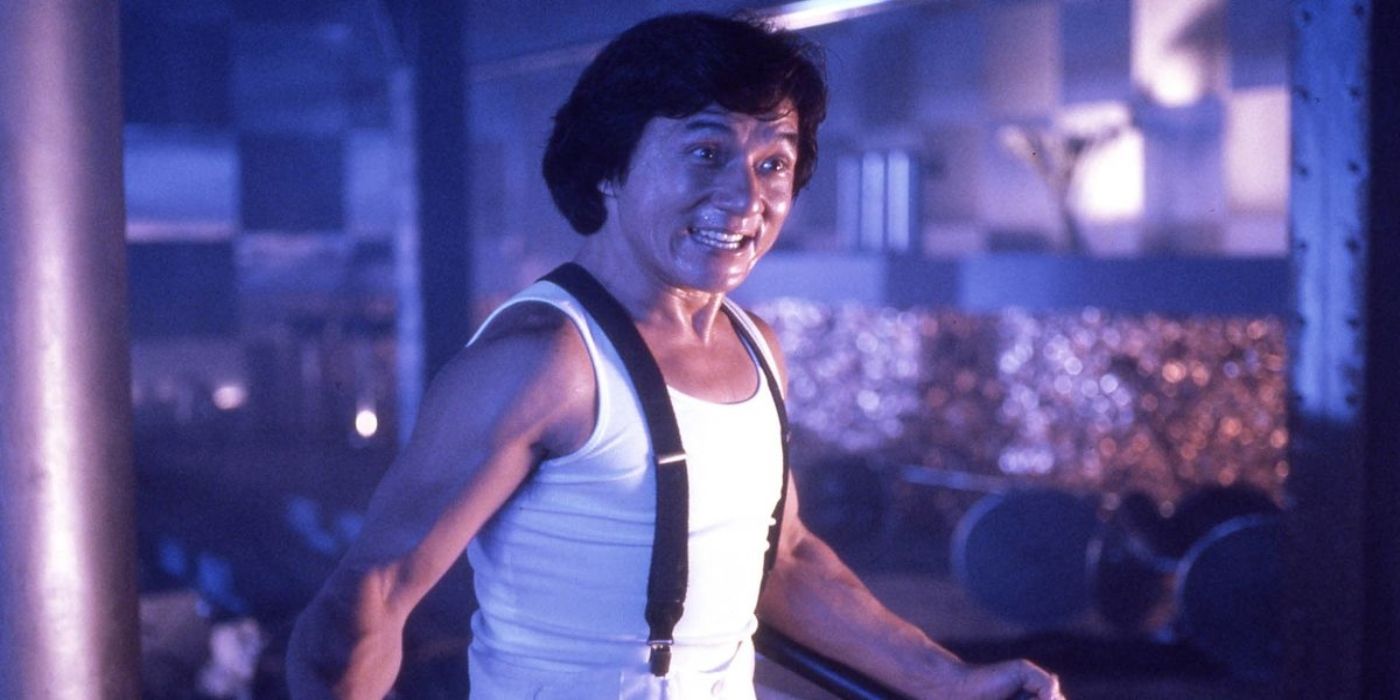 Jackie Chan as Ryo Saeba wearing suspenders and a white undershirt fighting in City Hunter