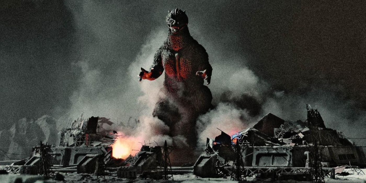 Godzilla stomping through a military base camp