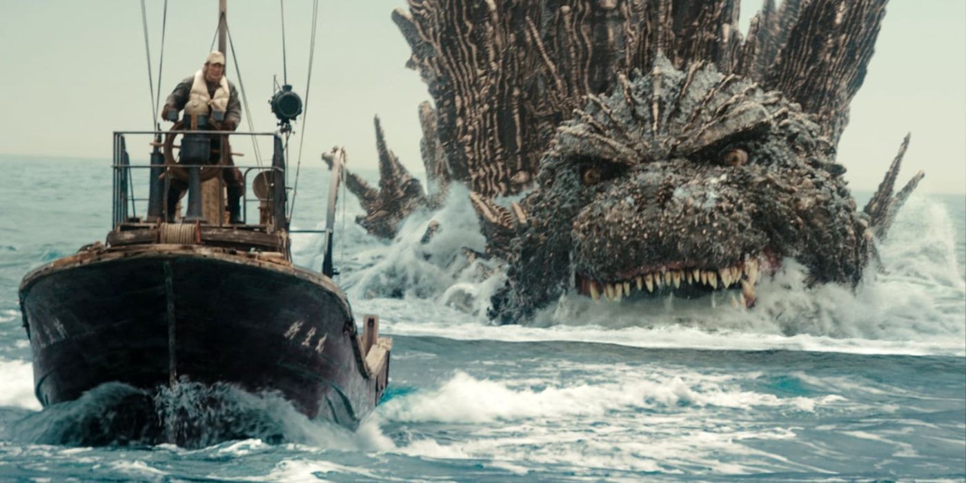 Godzilla chases a small boat in the ocean in Godzilla Minus One