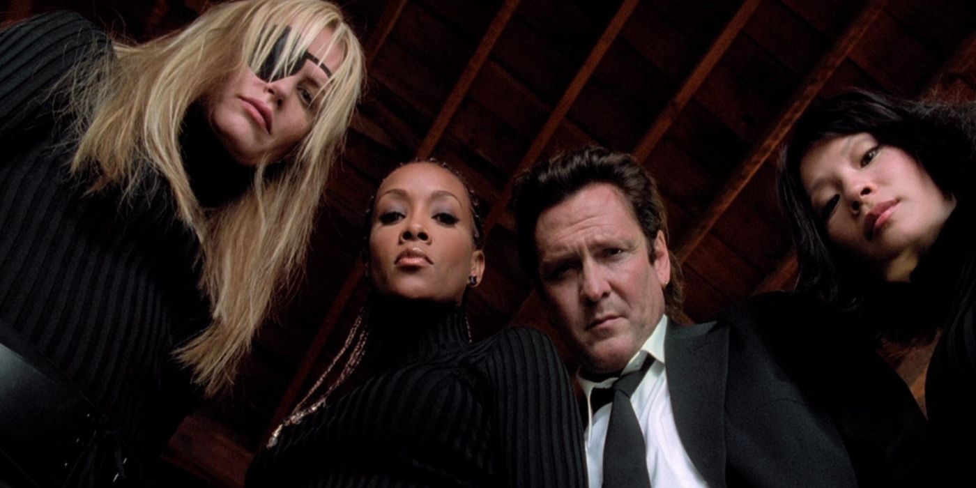 Kill Bill assassins Lucy Liu, Michael Madsen, Daryl Hannah, and Vivica A. Fox stare down at the beaten Bride