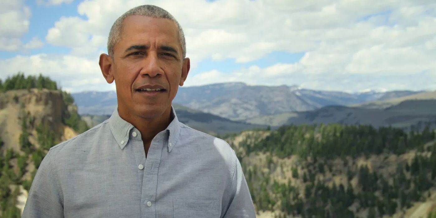 Barack Obama stands by a mountain in Our Great National Parks