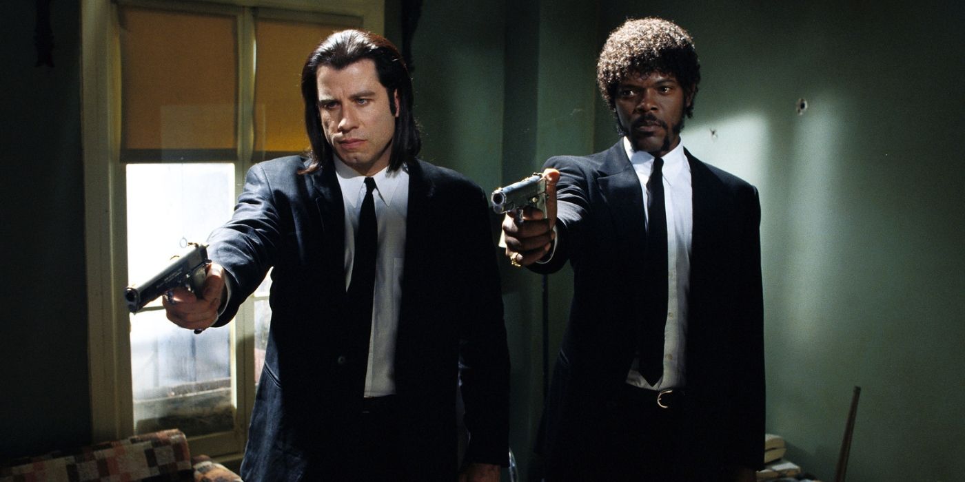 John Travolta as Vincent and Samuel L. Jackson as Jules, holding guns, in Pulp Fiction