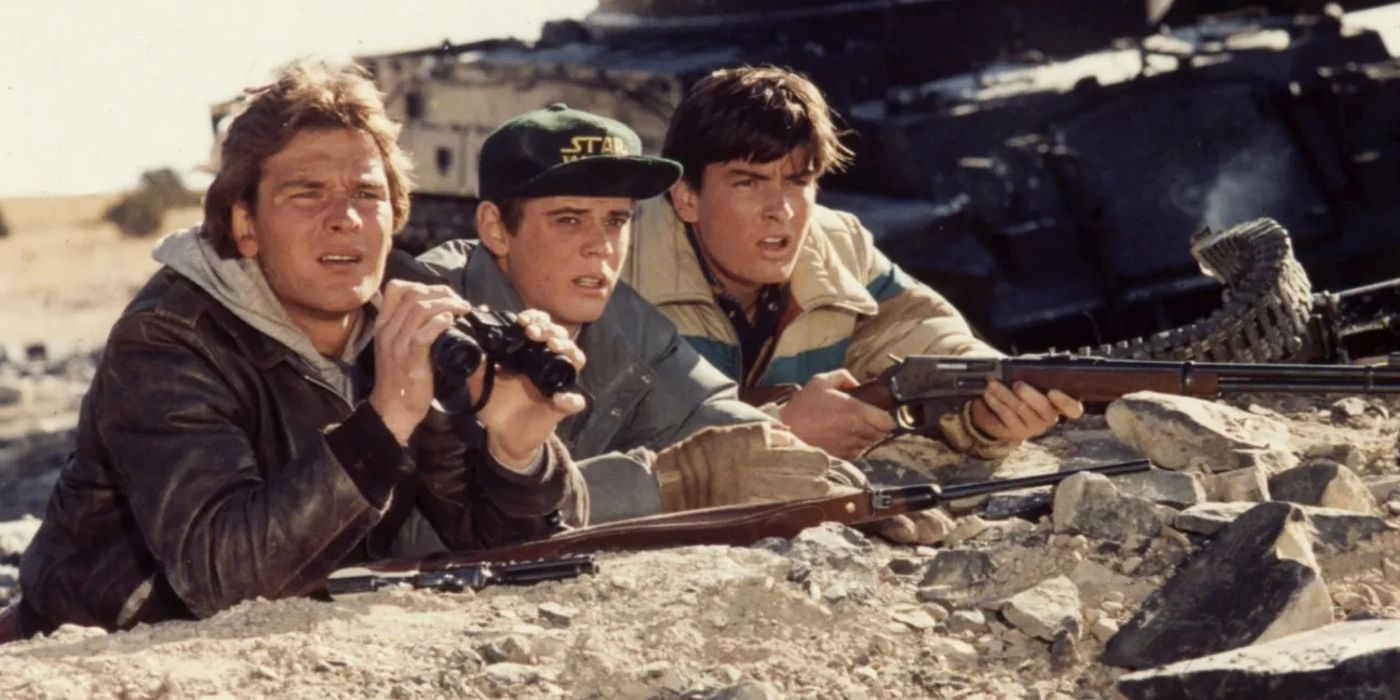 The boys hold rifles in Red Dawn