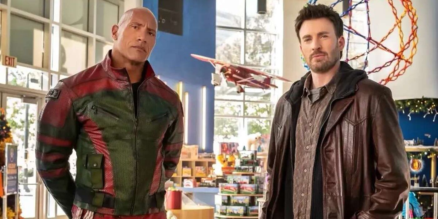 Red One stars Dwayne Johnson and Chris Evans stare down the camera.