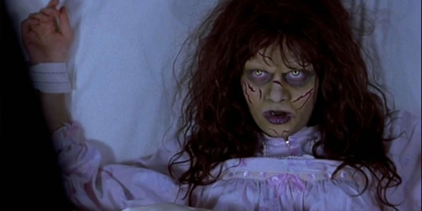 Natasha Lyonne as Megan Voorhees strapped to a bed with green skin and cuts on her face in Scary Movie 2