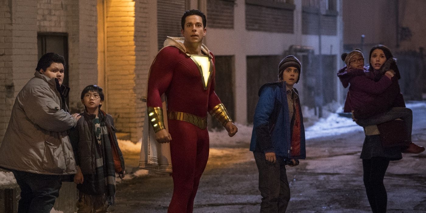 Zachary Levi's Shazam stands in an abandoned alley with a bunch of kids