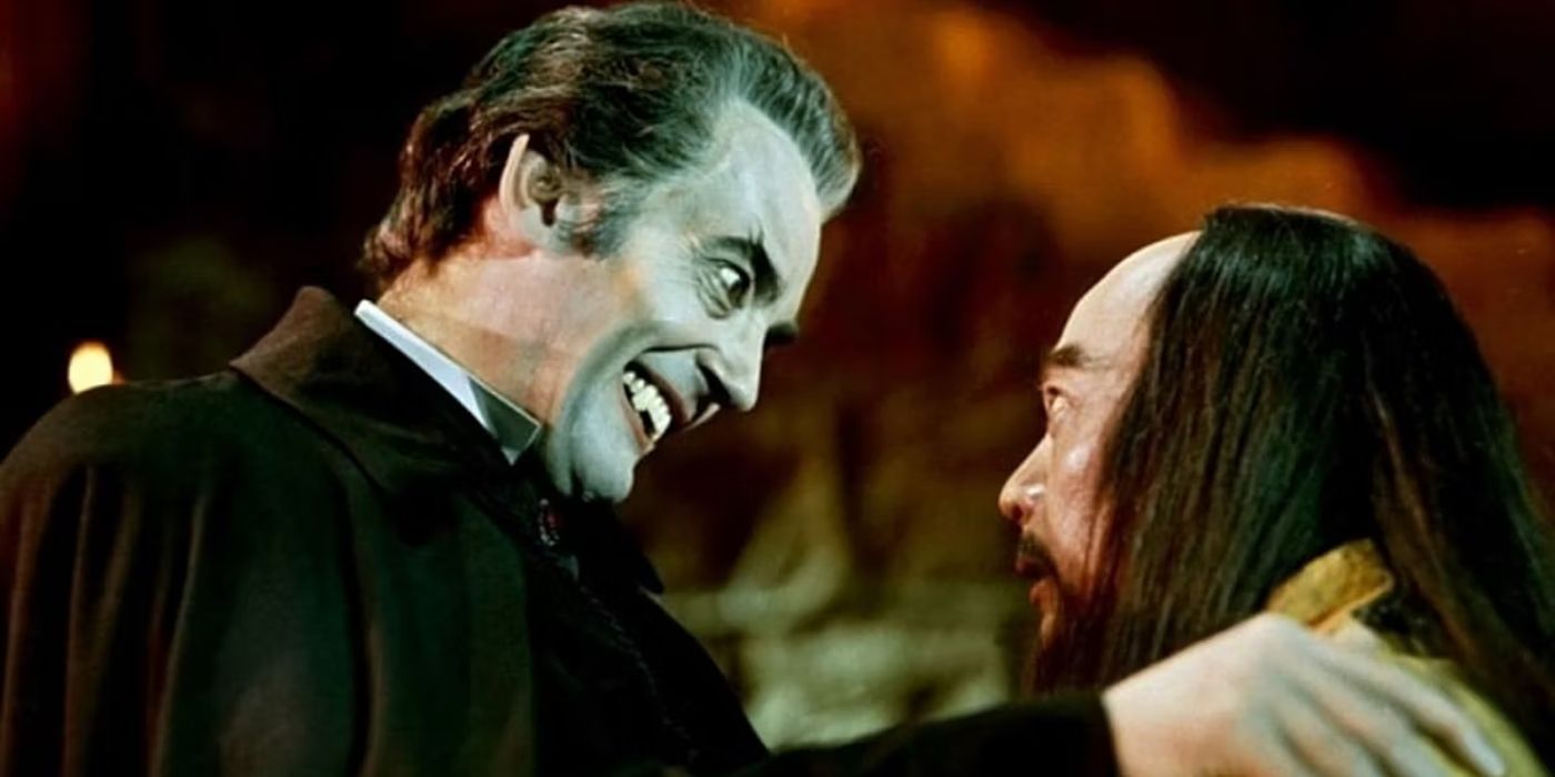 The 7 Brothers Meet Dracula dracula holds a man by the shoulders