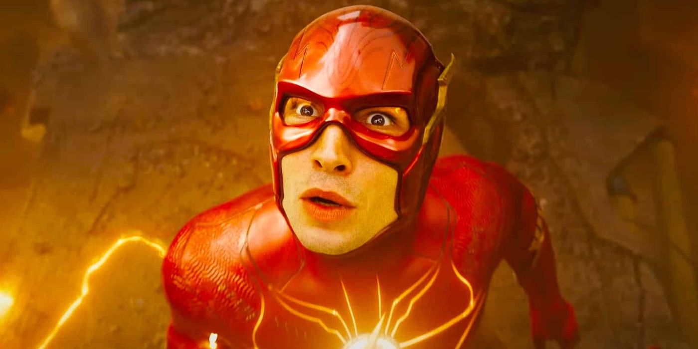 Ezra Miller as Barry Allen aka The Flash wearing his red suit with electricity next to him in The Flash