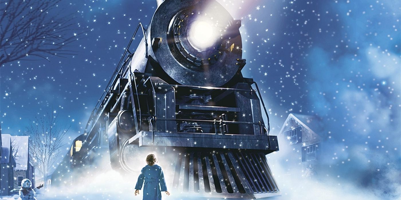 Um menino olha para um trem enorme