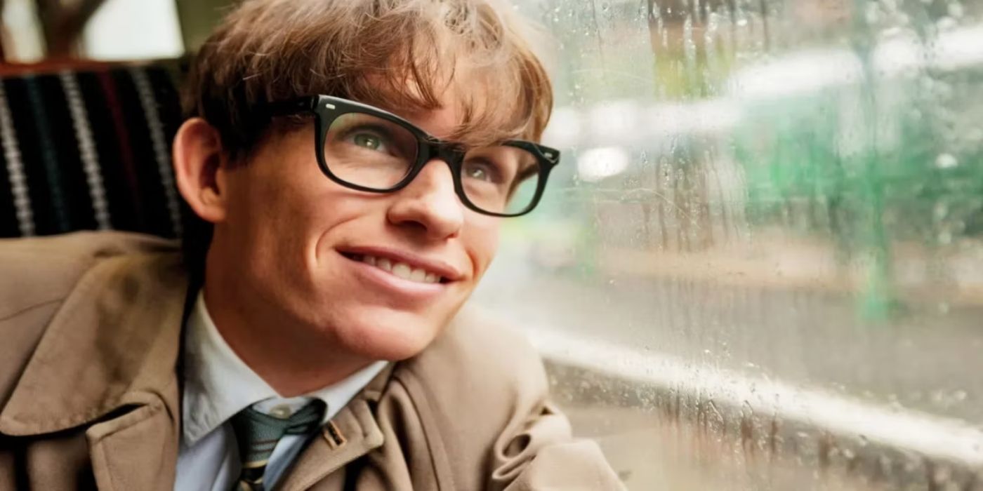 The Theory of Everything Eddie Redmayne as Stephen Hawking looking up through a window