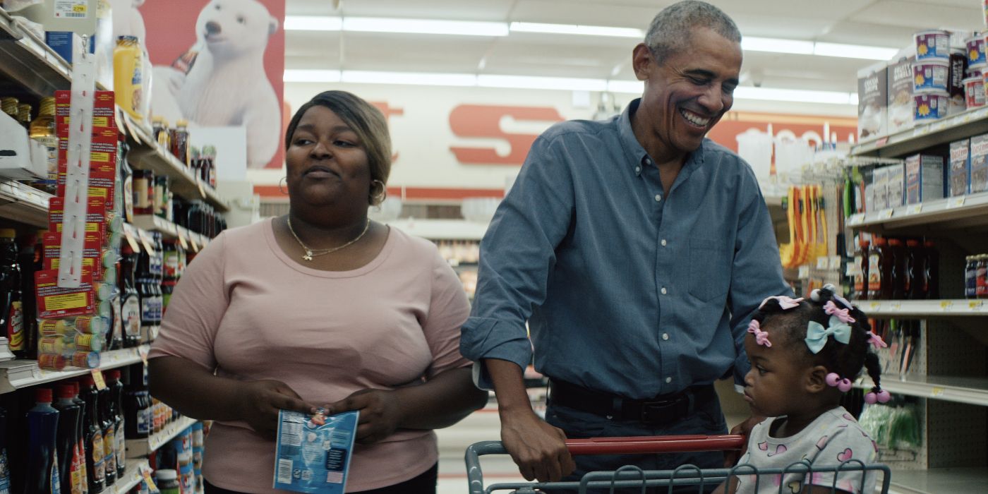 Barack Obama pushes a shopping cart in Working: What We Do All Day