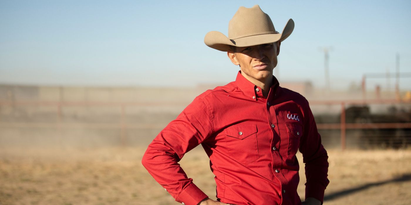 Jefferson White as Jimmy in Yellowstone, wearing a red 6666 shirt and a cowboy hat on a ranch.