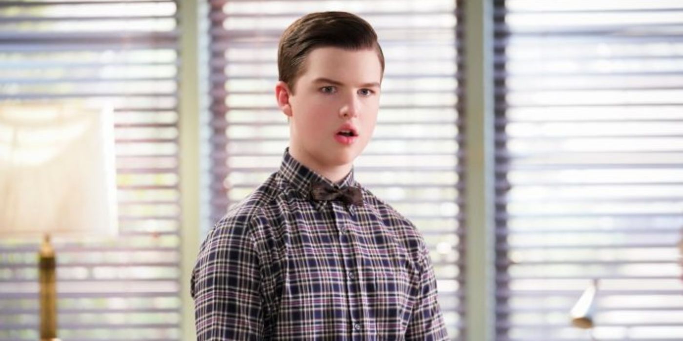 Iain Armitage as Sheldon Cooper standing with his mouth open in an office in Young Sheldon