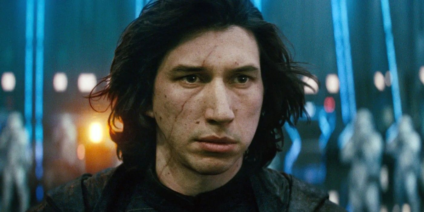 Adam Driver as Kylo Ren with dishevelled hair and a scar running down his face in Star Wars
