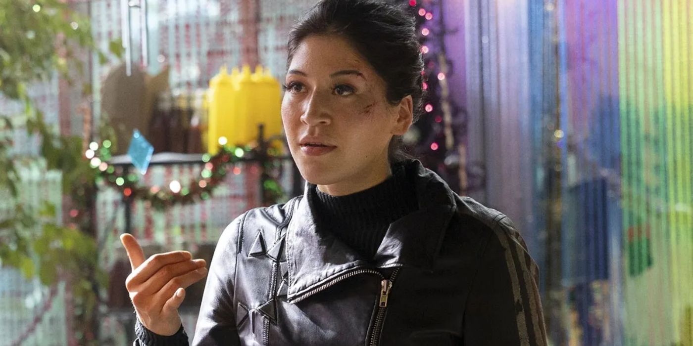 Alaqua Cox in Marvel Studios' Echo wearing a leather jacket with cuts on her face