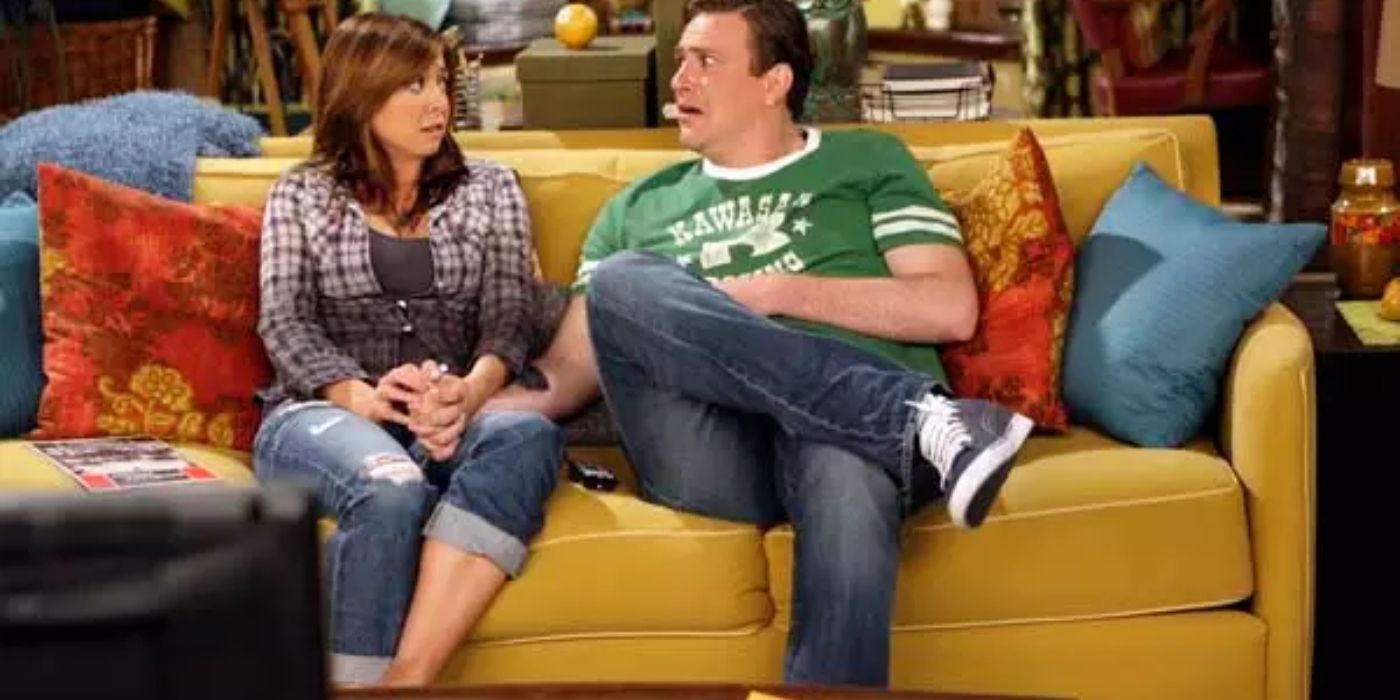 Alyson Hannigan and Jason Segel as Lily and Marshall in How I Met Your Mother looking at each other