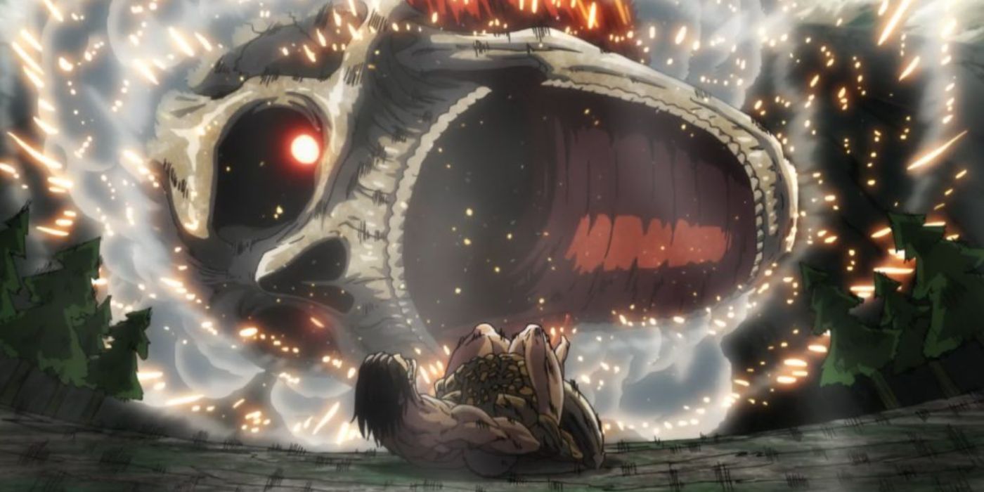A titan's head falls close to a man tied up with rope in Attack on Titan