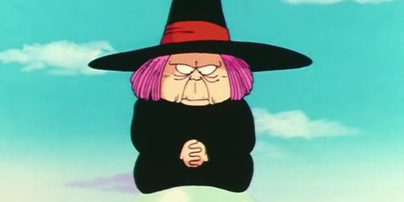 A old, pink-haired witch dressed in black, with a black hat, floats in the sky