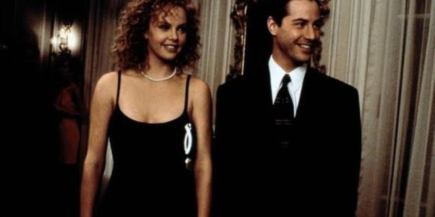 Scene from The Devil's Advocate with Charlize Theron and Keanu Reeves 