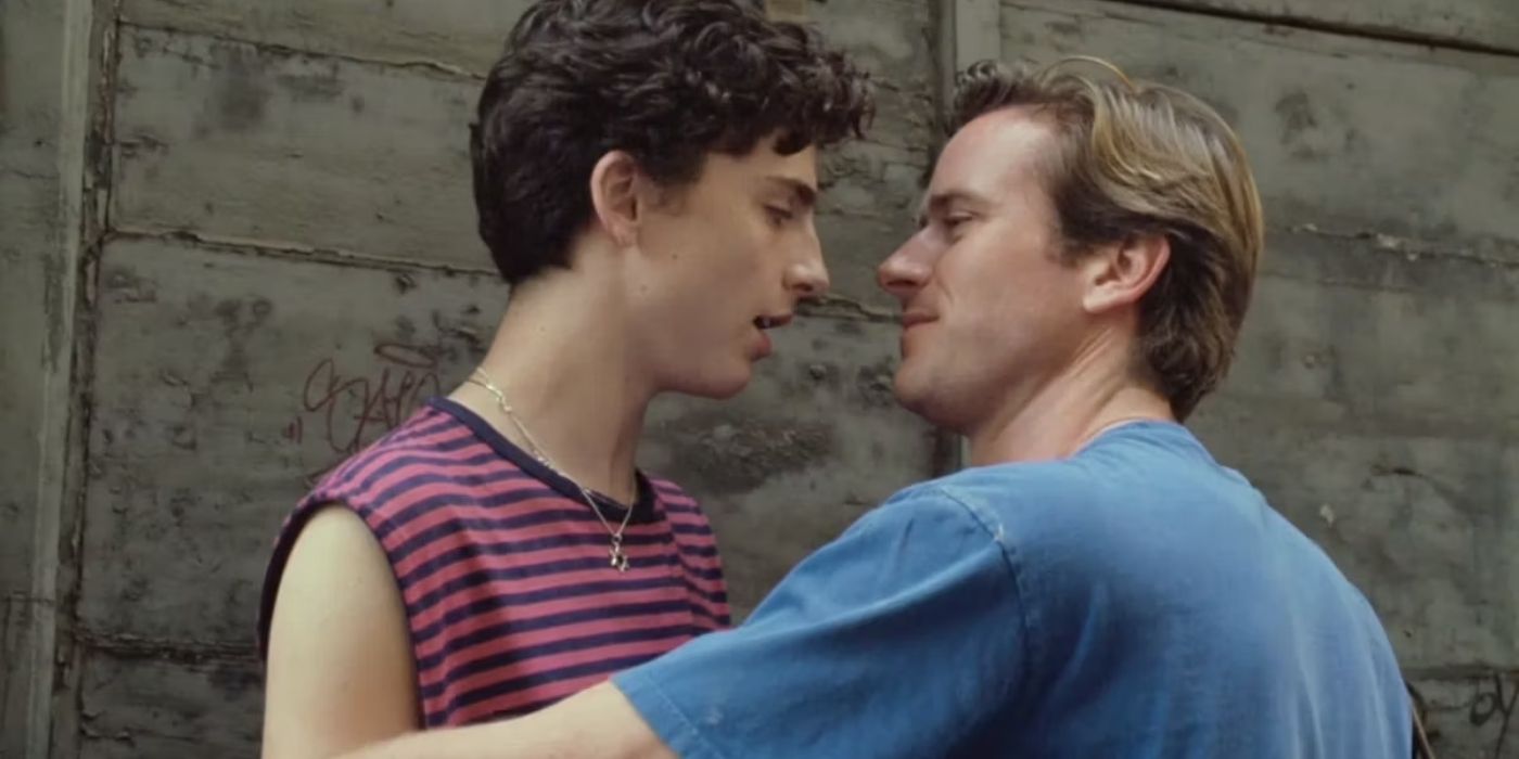 Armie Hammer as Oliver leans into Timothee Chalamet as Elio for a kiss in Call Me By Your Name