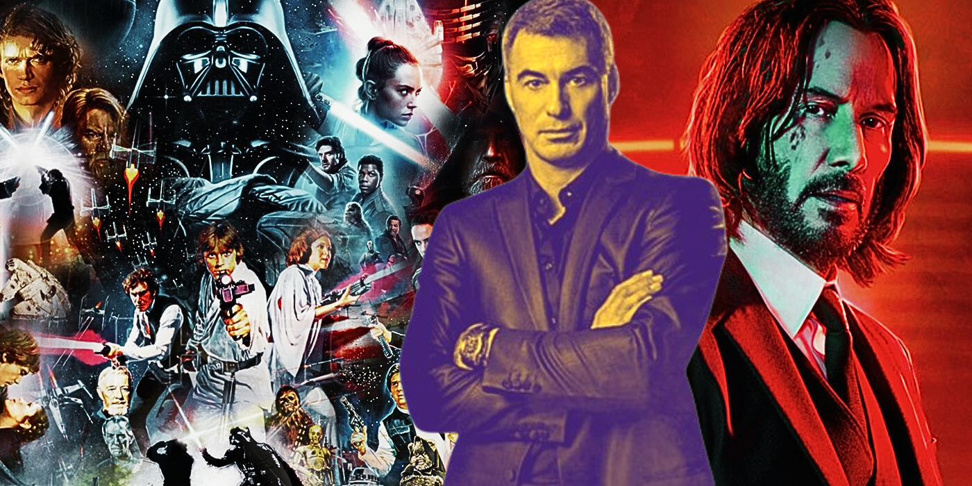 Chad Stahelski standing in front the Star Wars aaga and John Wick.