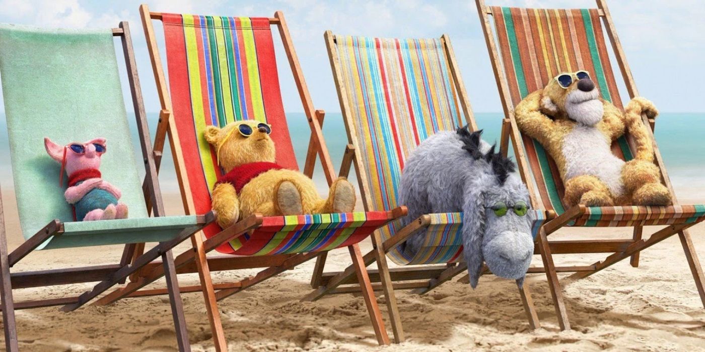 A live-action Piglet, Pooh, Eeyore, and Tigger lounging on beach chairs